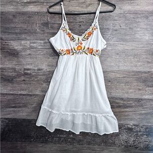 Dizzy Lizzy Elegant White Dress with Orange Floral Accents